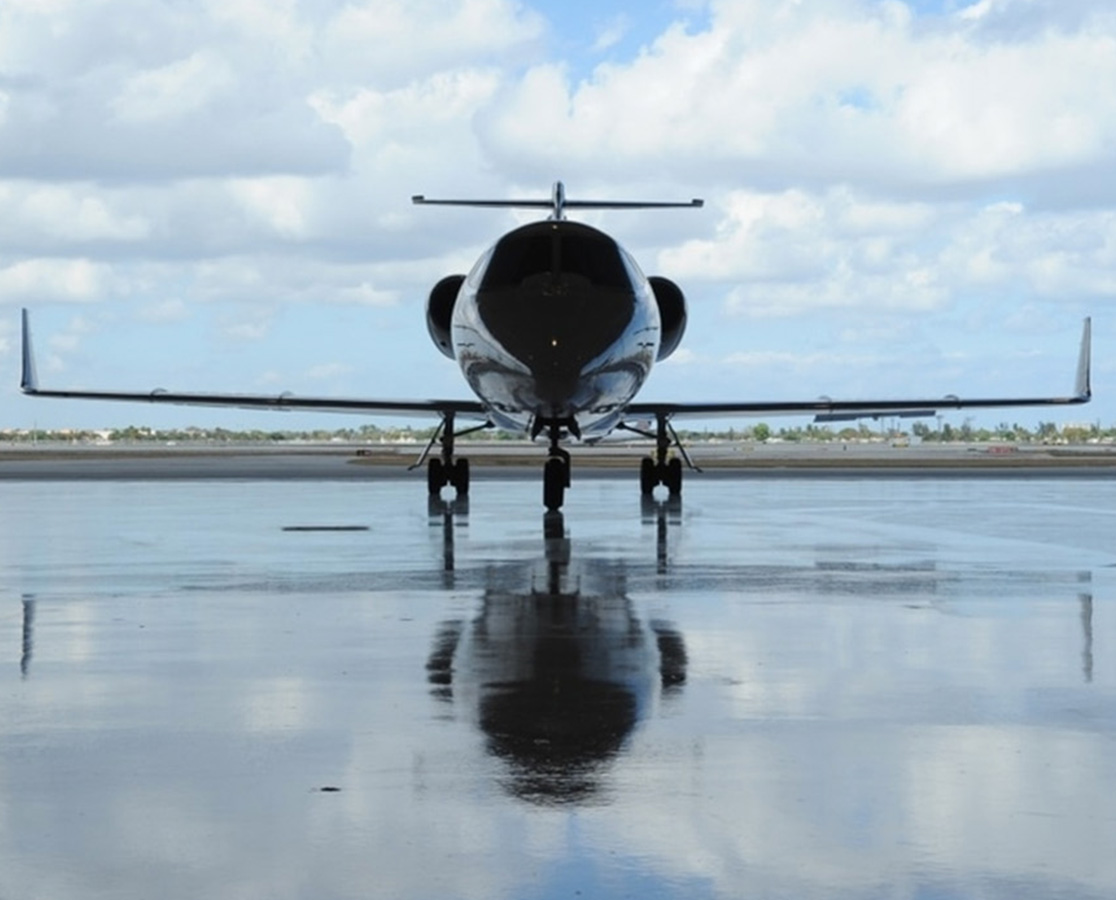 private jet inside airplane hanger